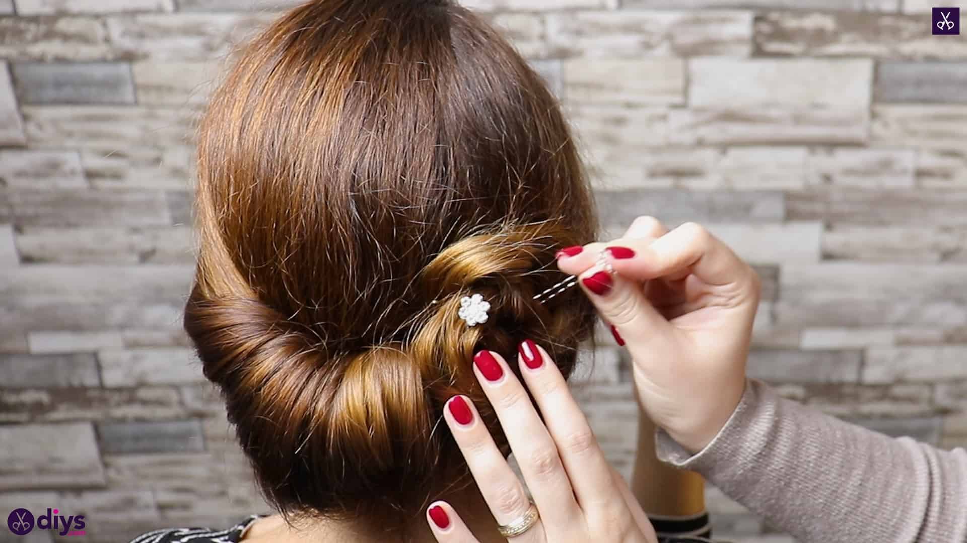 Beautiful summer bun with flowers hairstyle step 5