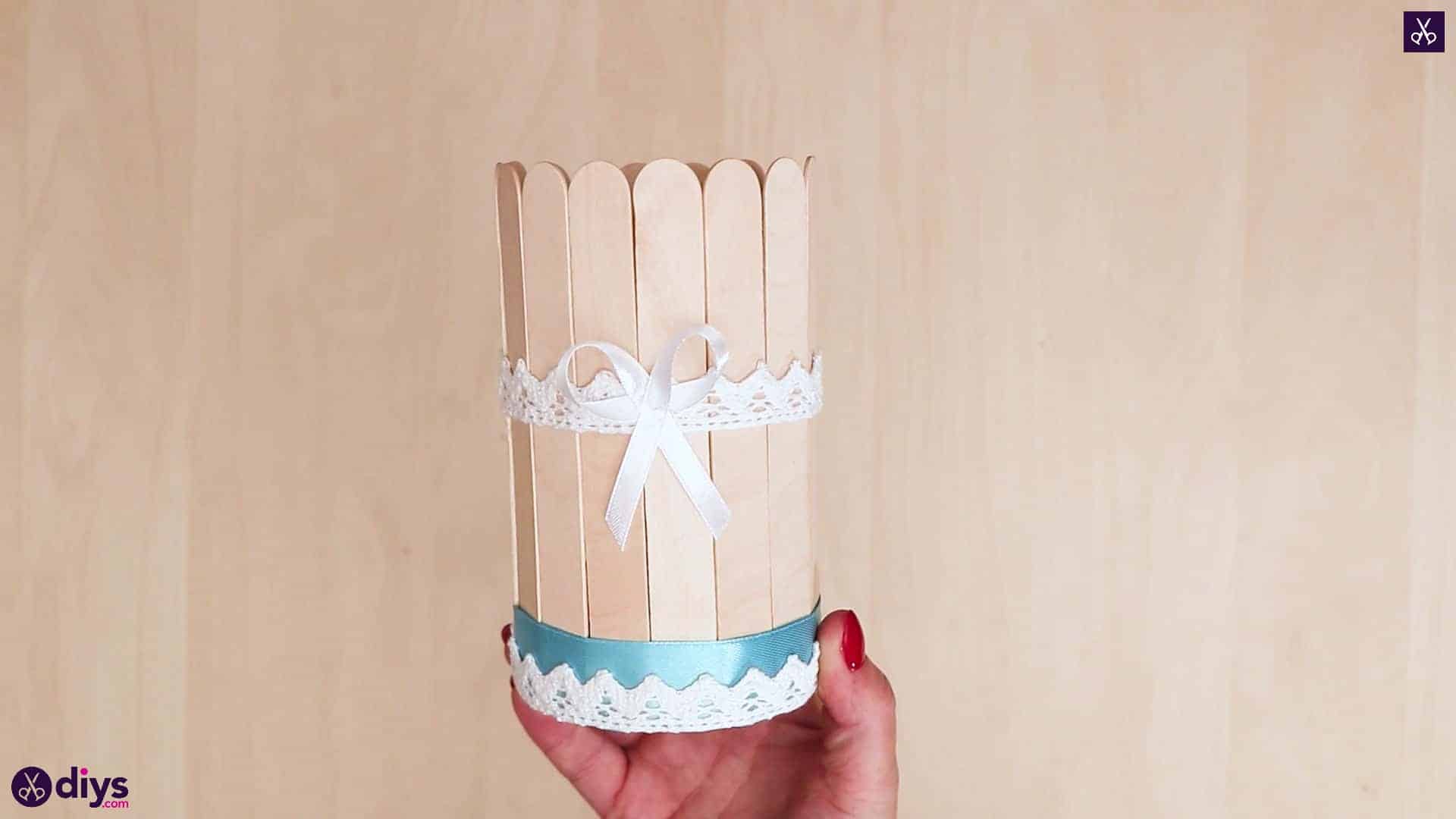 Elegant popsicle stick covered tin container