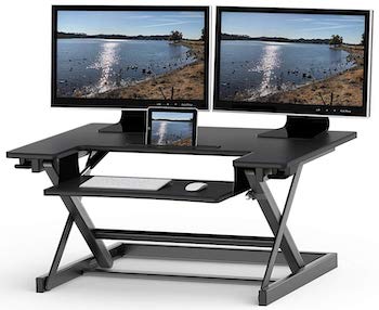 Height adjustable sit to standing desk converter riser workstation