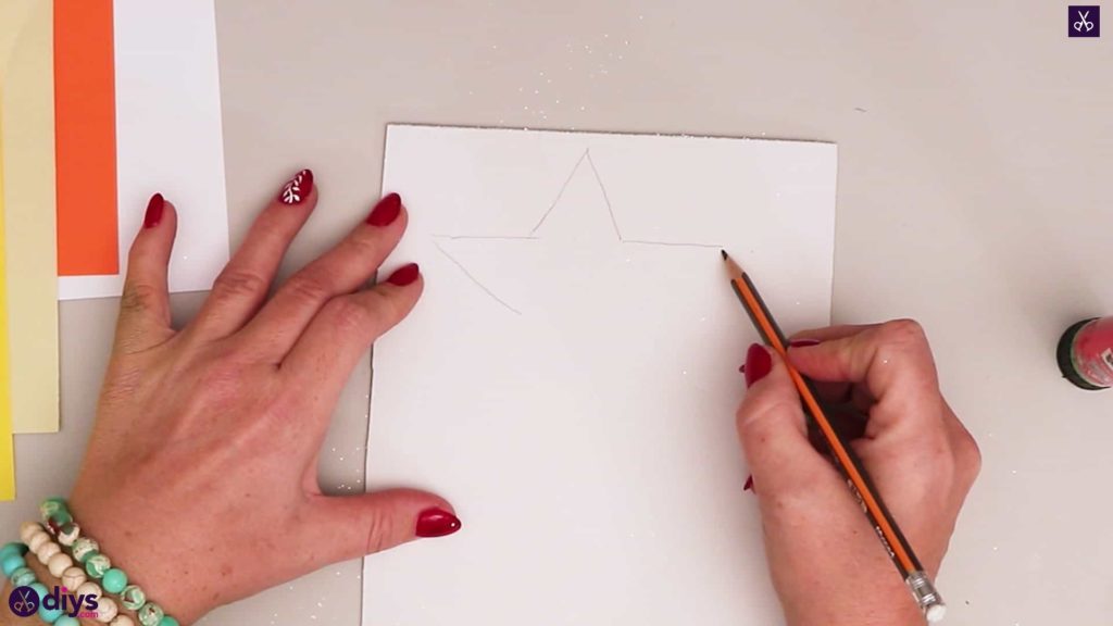 Paper candle on a star drawing