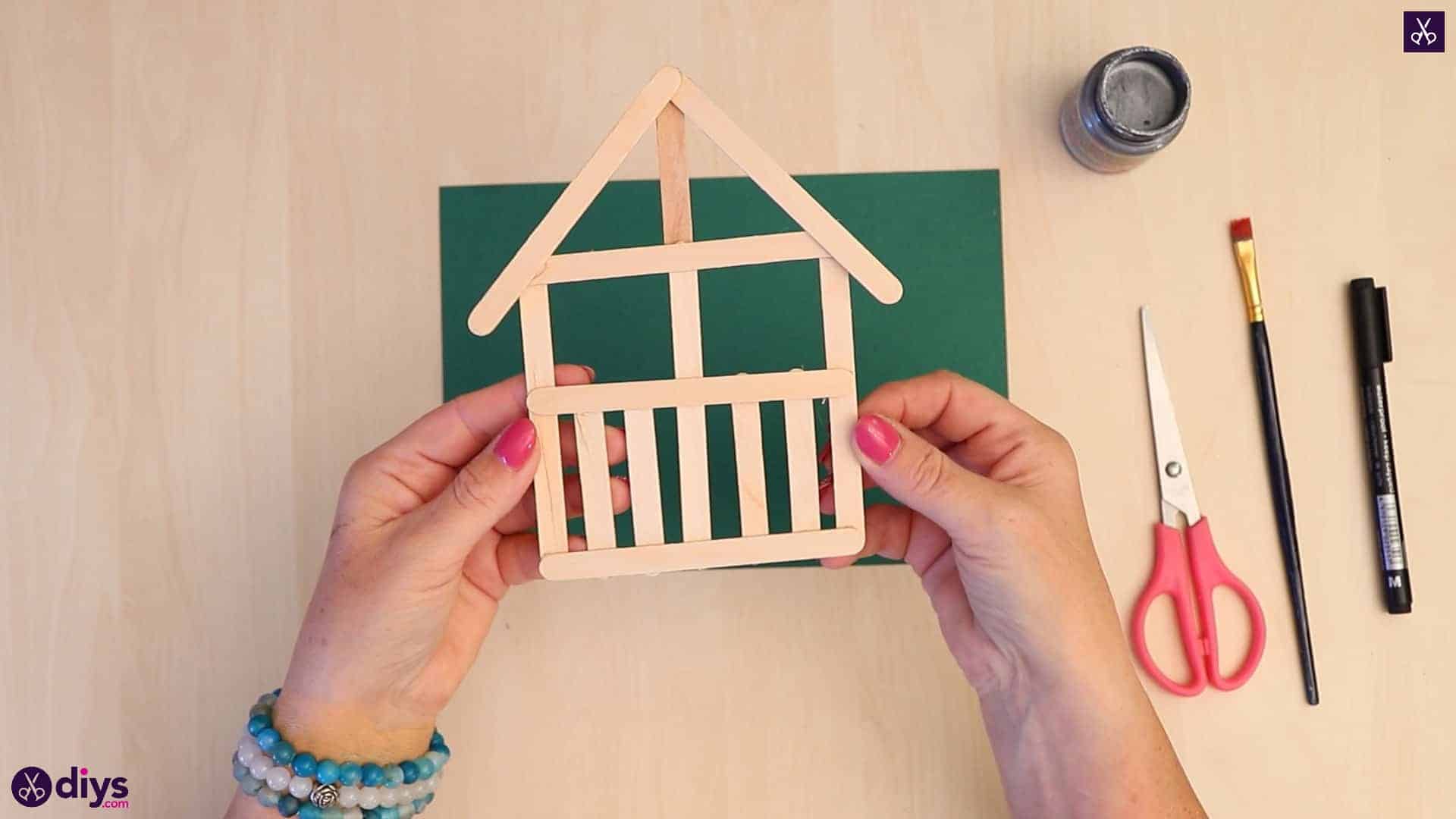 Popsicle stick house ornament house like