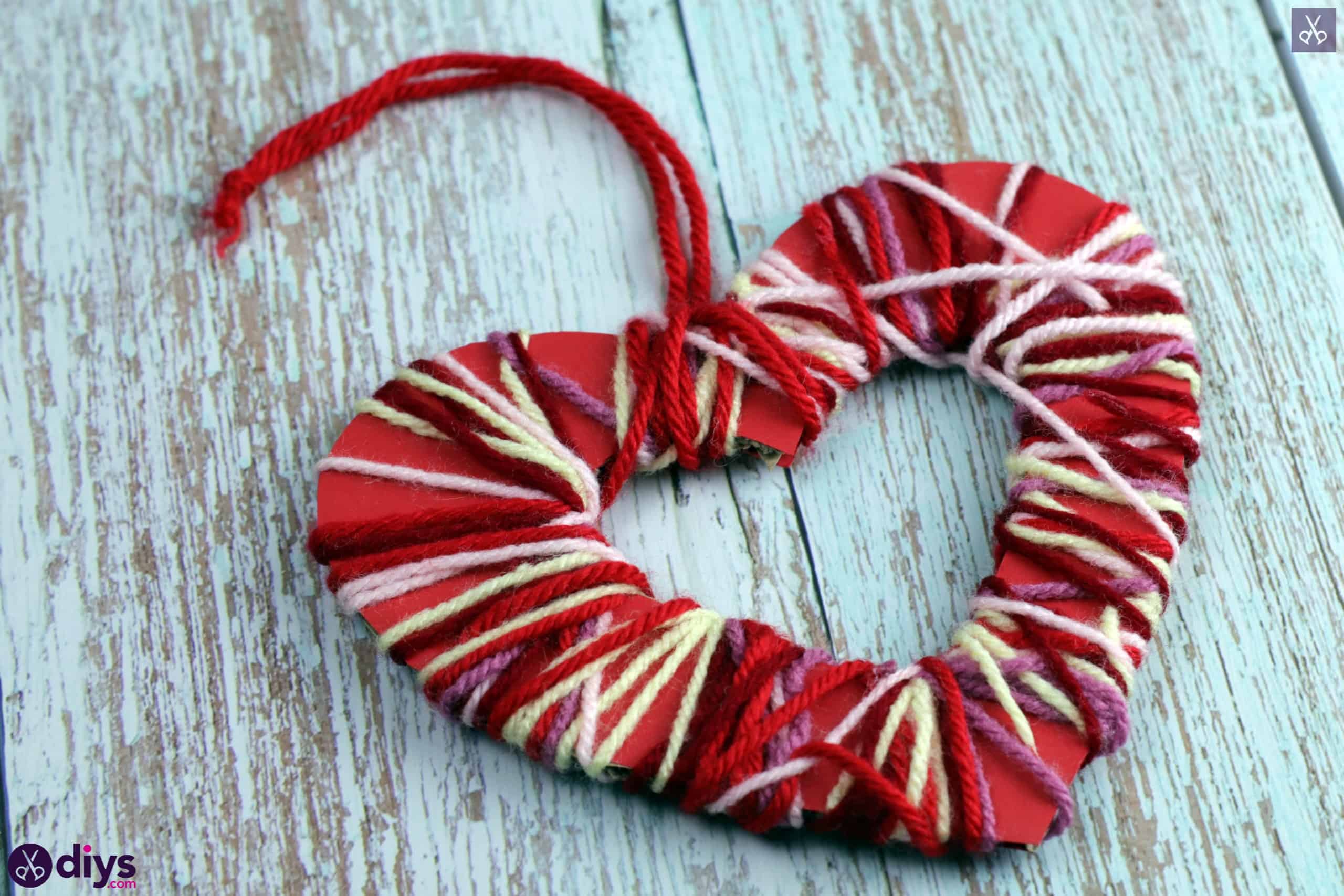 Diy yarn wrapped paper heart craft