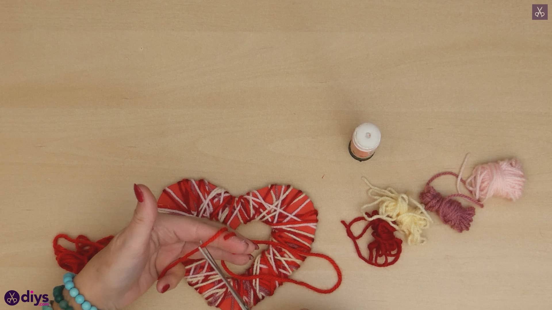 Diy yarn wrapped paper heart step 7