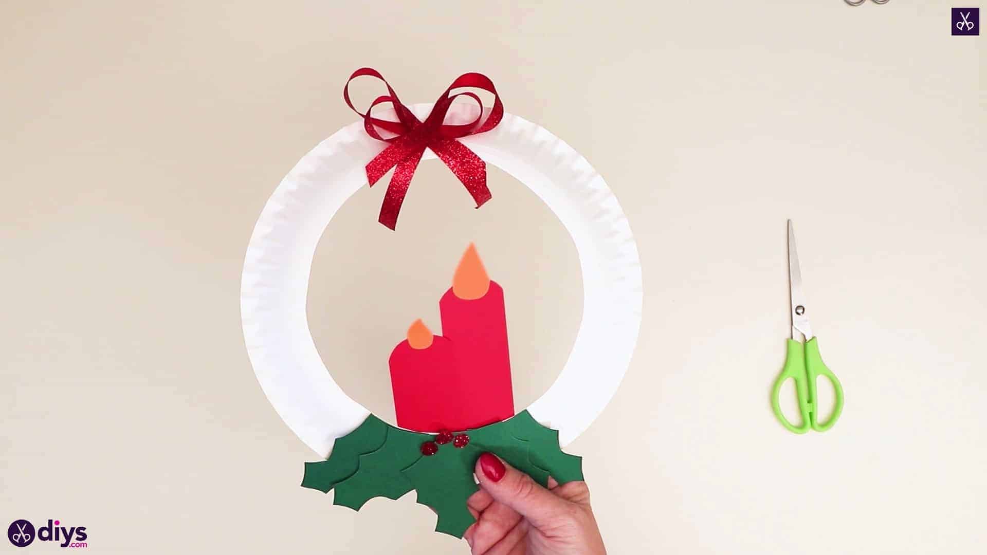 Paper plate wreath with a candle