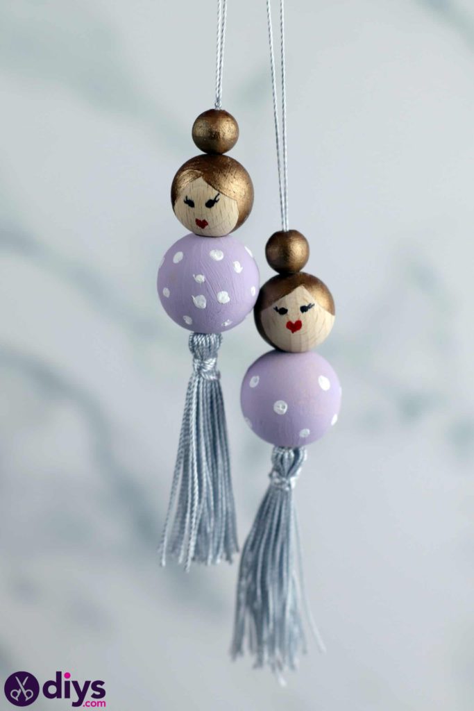Wooden pearl doll