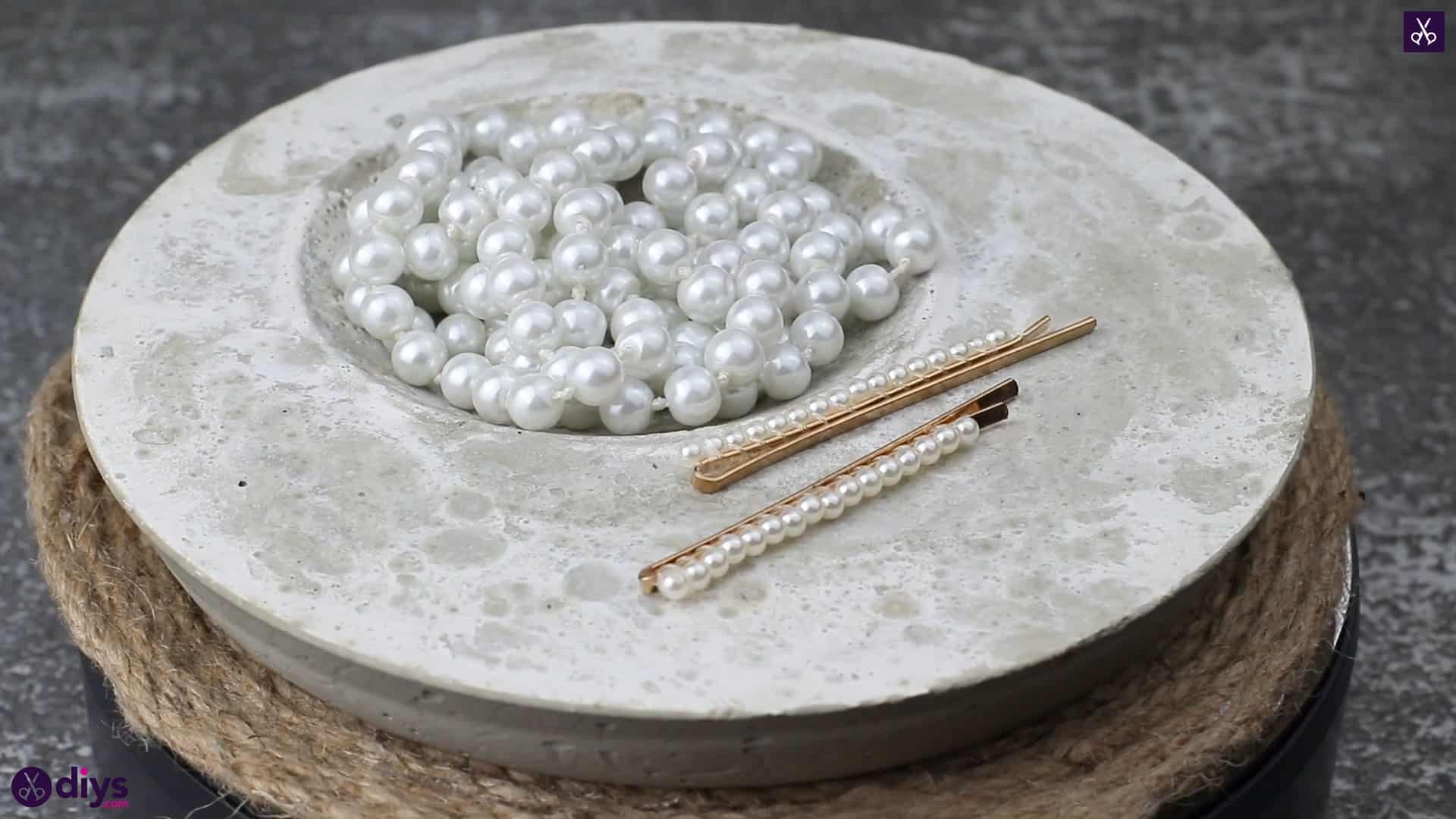 Diy concrete jewelry holder dish on table