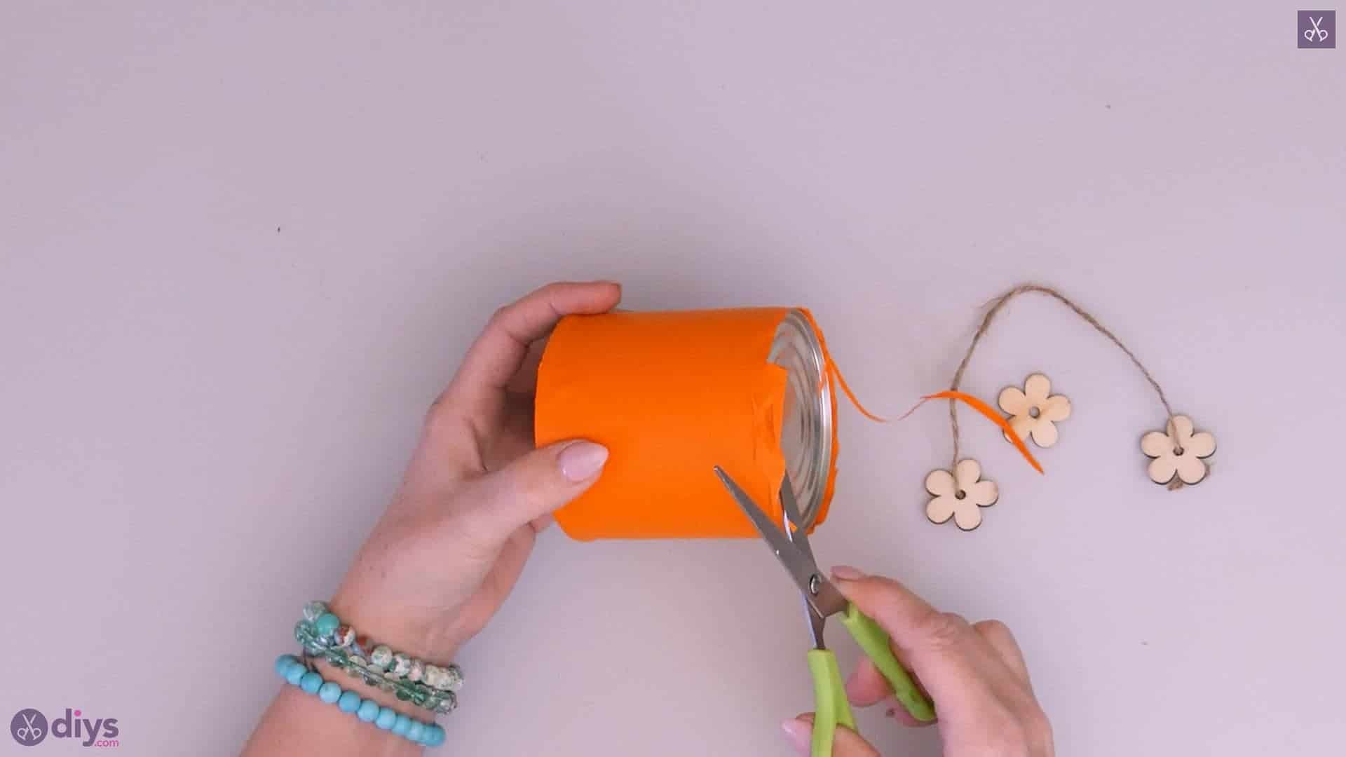 Tin can container with wooden flowers step 3d