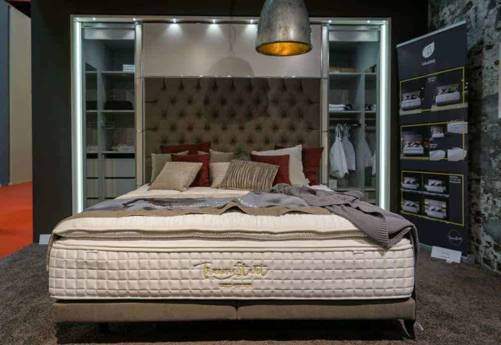 Bedroom design with tufted headboard and mattress