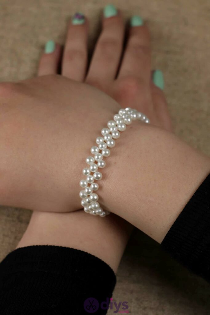 Diy elegant white beads bracelet hands