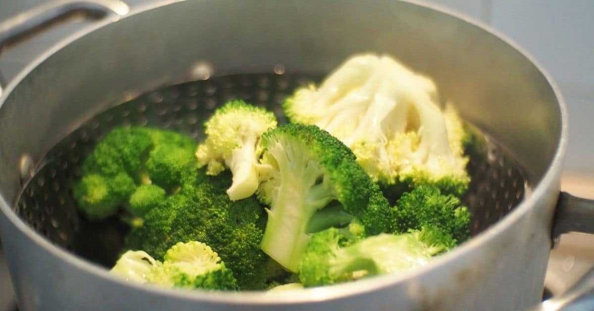 Steaming broccoli before freezing.