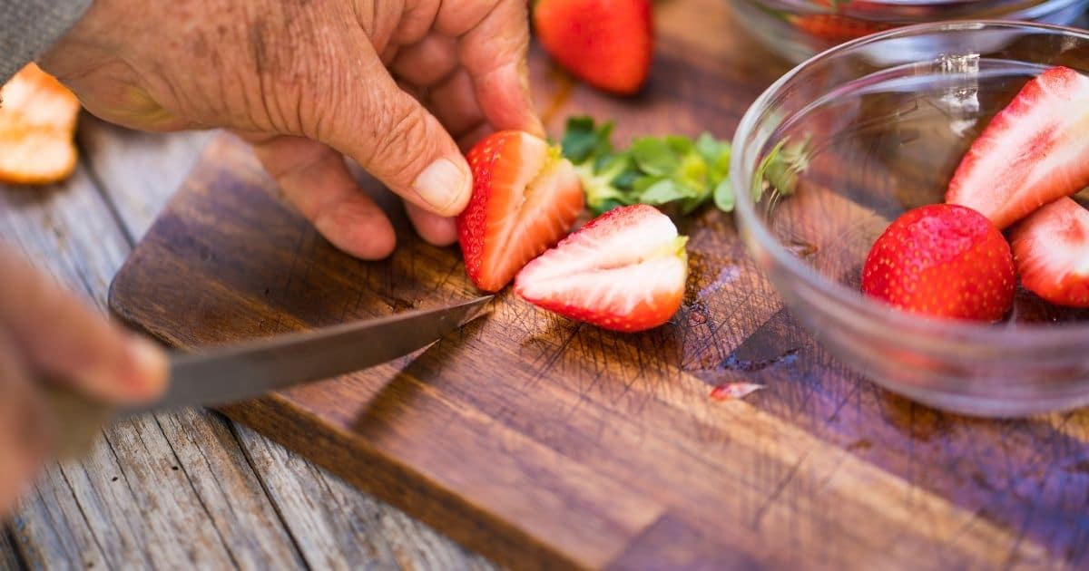 Freeze Macerated Strawberries - Slicing strawberries