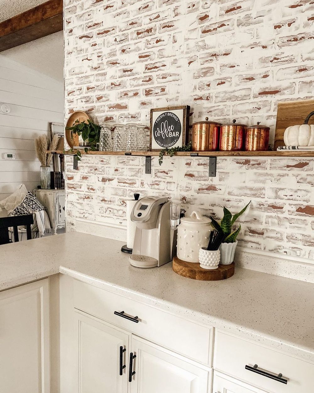 Kitchen with faux brick paneling