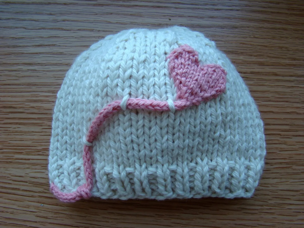 Heart on a string hat