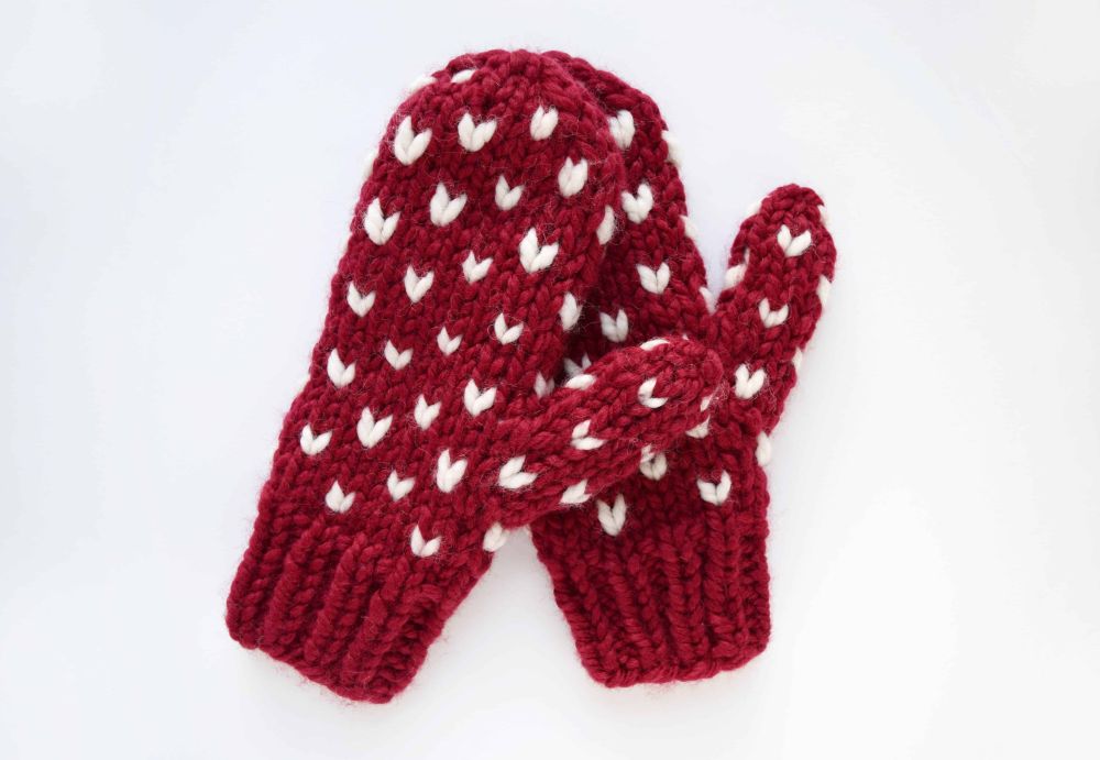 Red mittens with white hearts