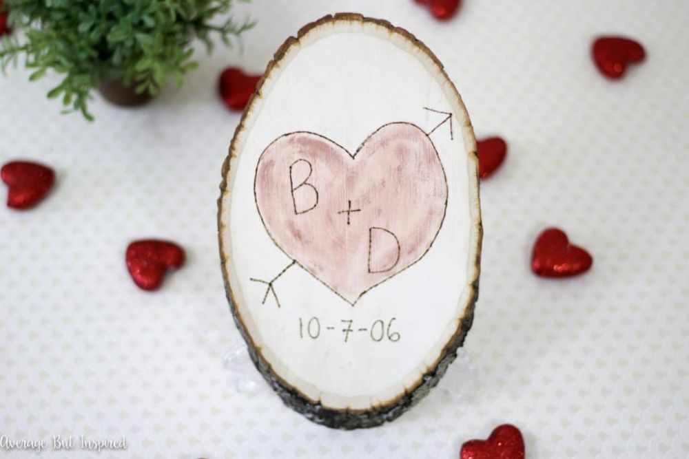 Diy carved initials on a wood slice