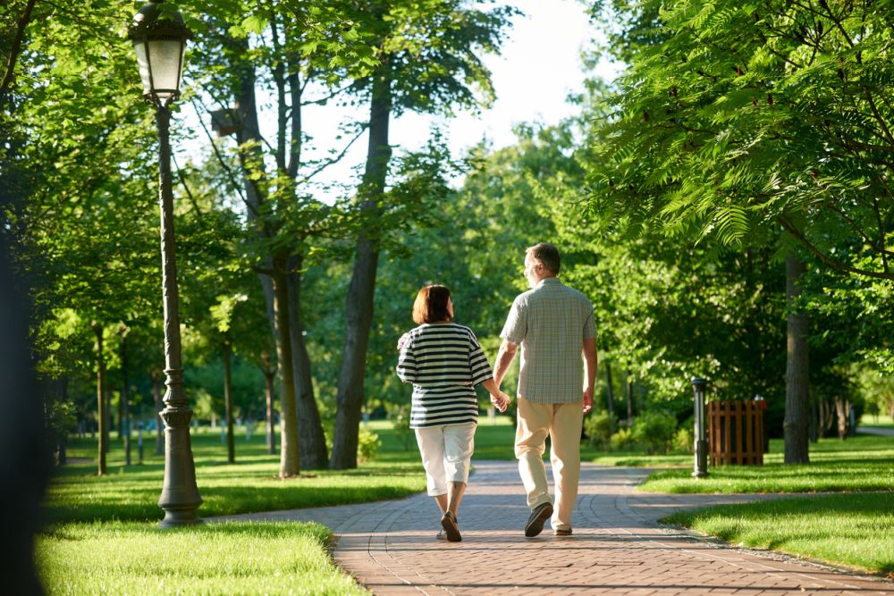 Couple walk in the park